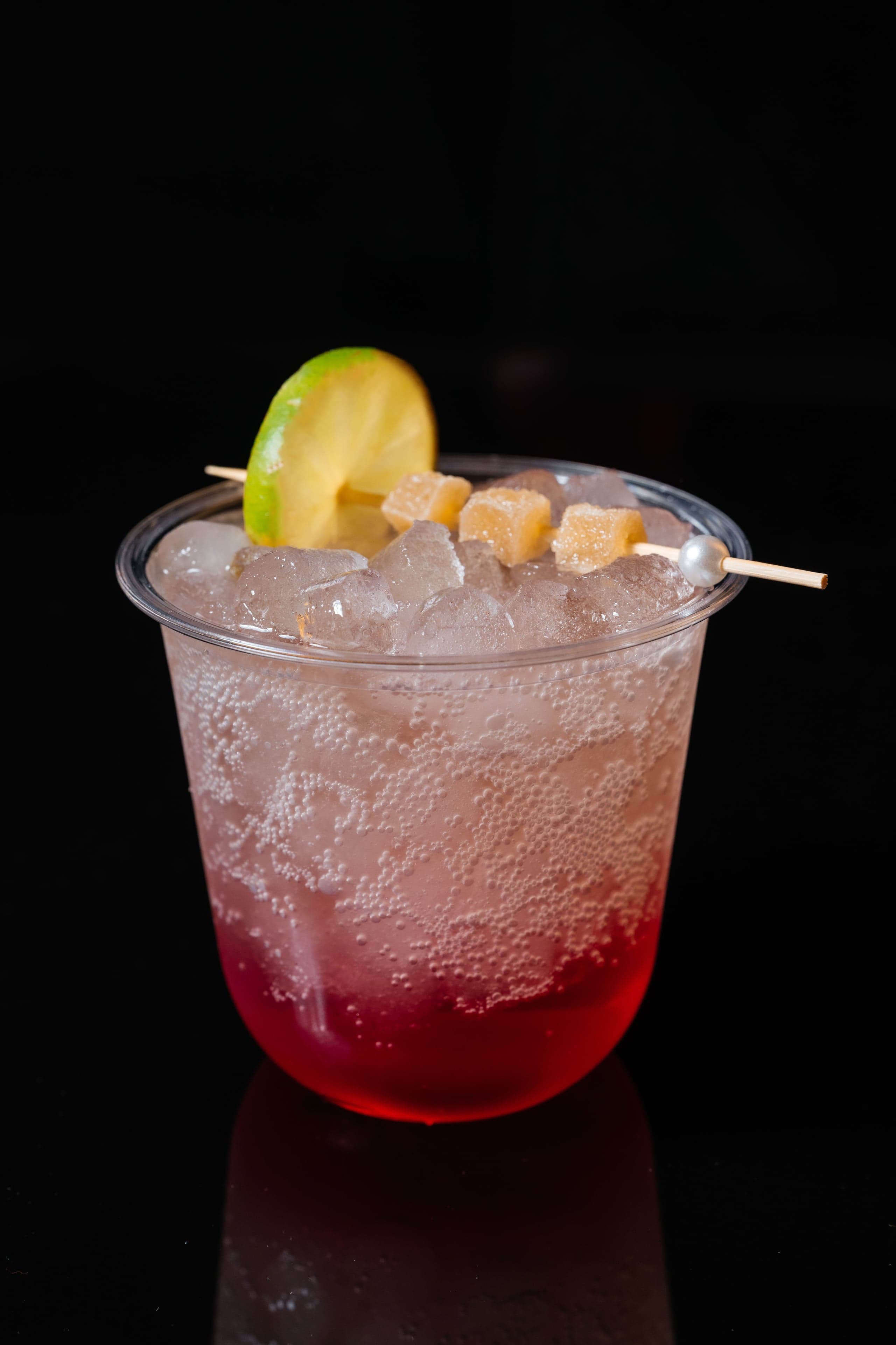 Ginger Dragon — dragonfruit syrup and ginger ale topped with fresh lime juice